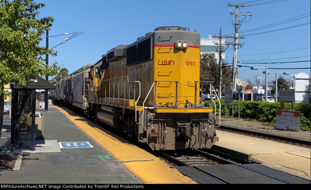 UP 1097 Leads the LSF51-10 through Broadway Station